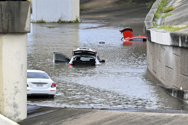 Vehicles are stranded near Downtown Houston after Hurricane Beryl came ashore in Texas.