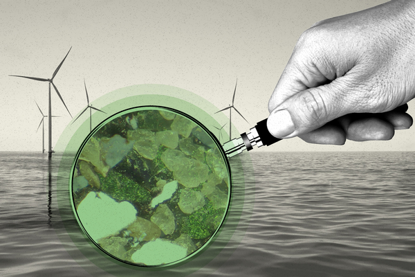 Photo collage illustration of offshore wind turbines and a hand with a magnifying glass over glauconite sand 