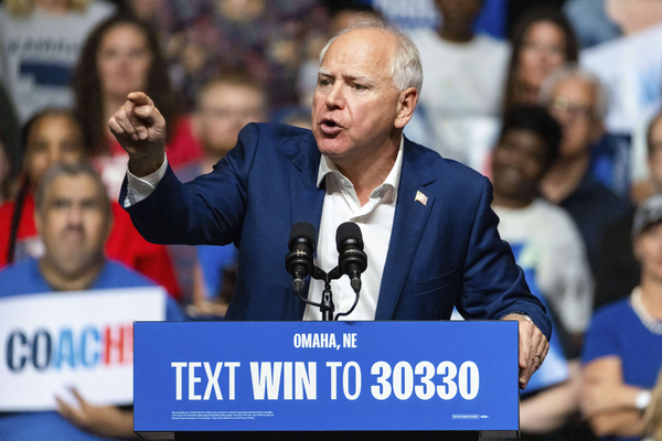 Democratic vice presidential nominee Minnesota Gov. Tim Walz speaks at a campaign rally on Saturday in La Vista, Nebraska.