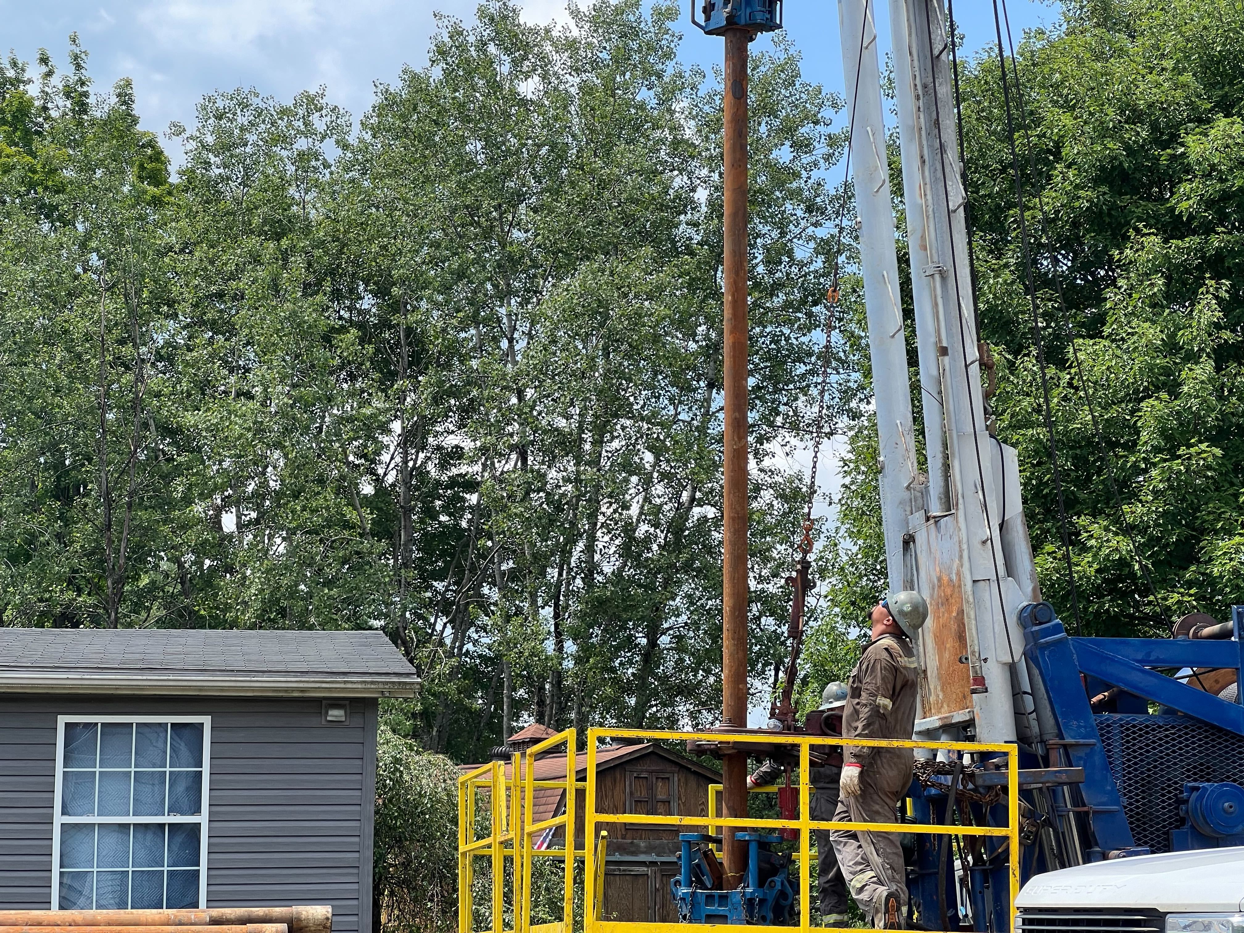 A worker operates well-plugging machinery in Pennsylvania. 